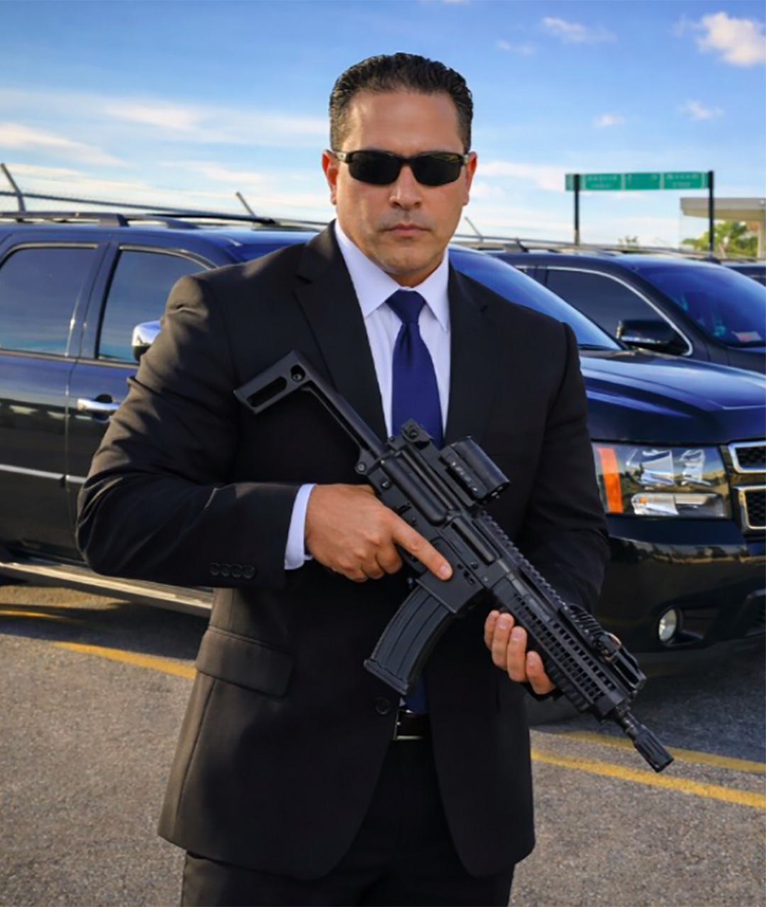 Guardion Protection security guard monitoring restricted area and perimeter fencing.